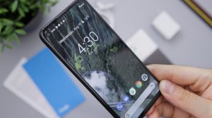Google Pixel phone from the Telstra shop being held